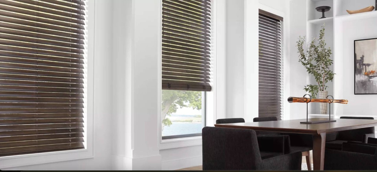 Hunter Douglas EverWood® Faux Wood Blinds in a dining room at Captivating Windows by Magnolias near Norfolk, Nebraska (NE)