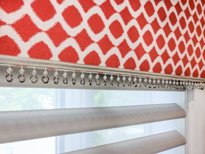 Fabricut Cornice with bottom ring bead trim over Hunter Douglas Motorized Pirouette