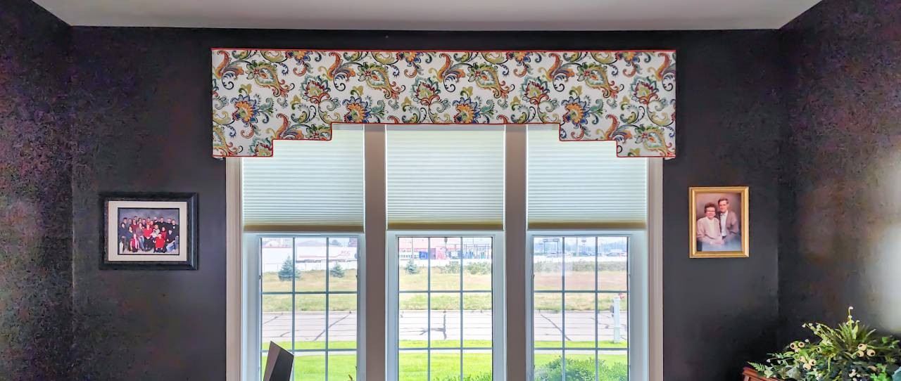 Fabricut shaped cornice with outline welt in pumpkin. Hunter Douglas Motorized Light Filtering Duette Honeycomb shades